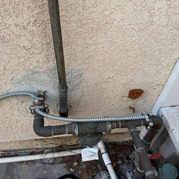 First Electric - Ground wiring from the fuse box to the waterline. - La Mirada, CA